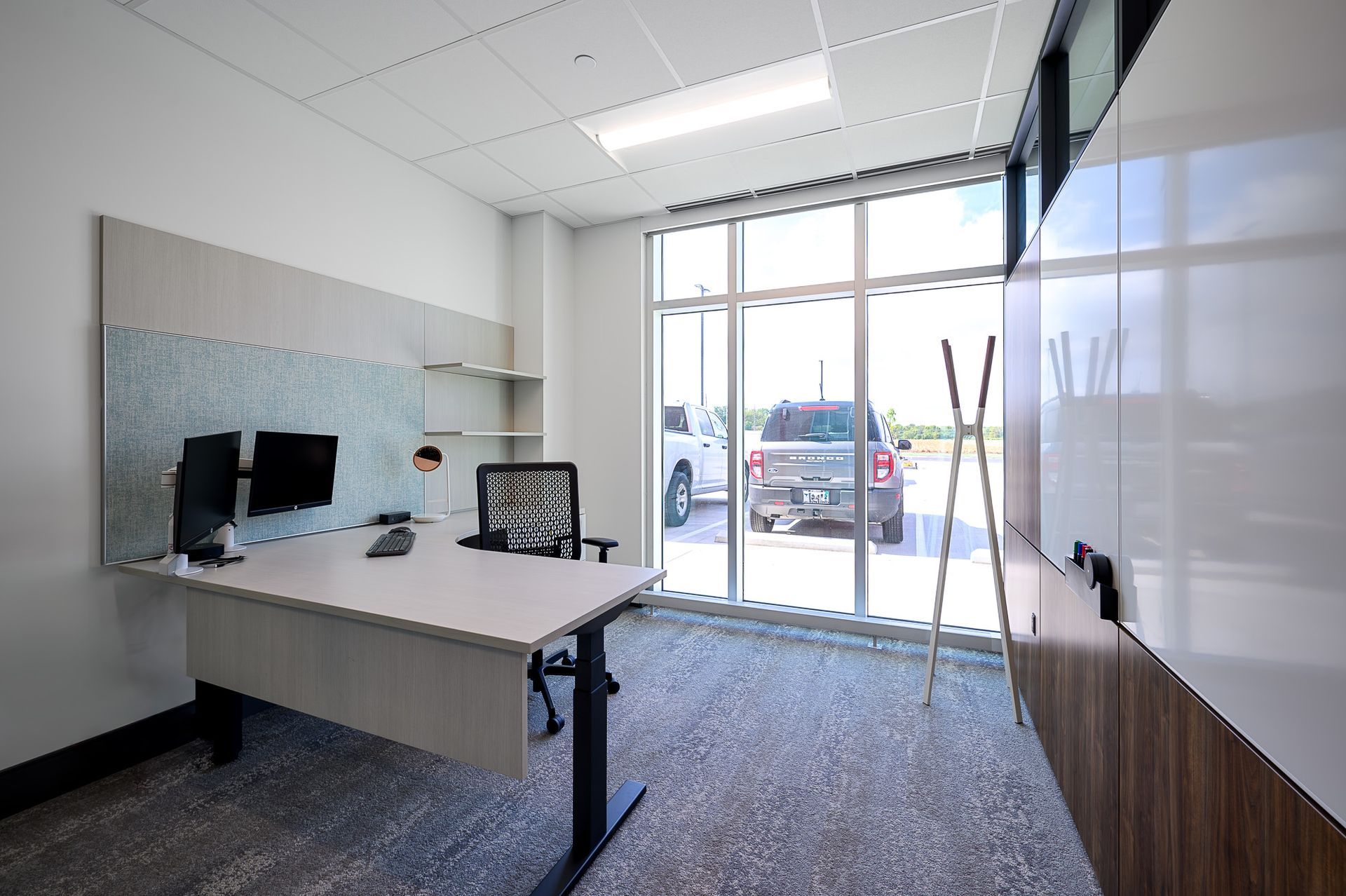 A small office with table and chair