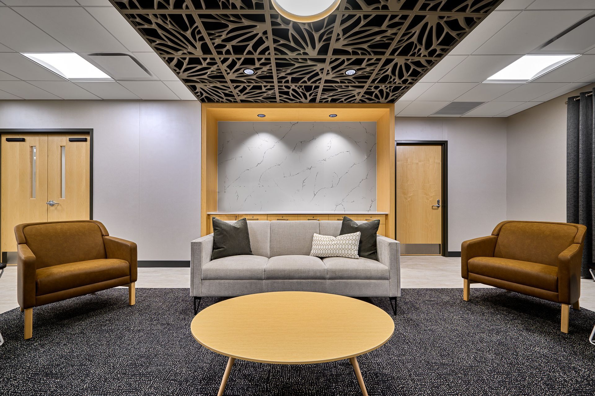 A beautiful lounge with couch and chairs