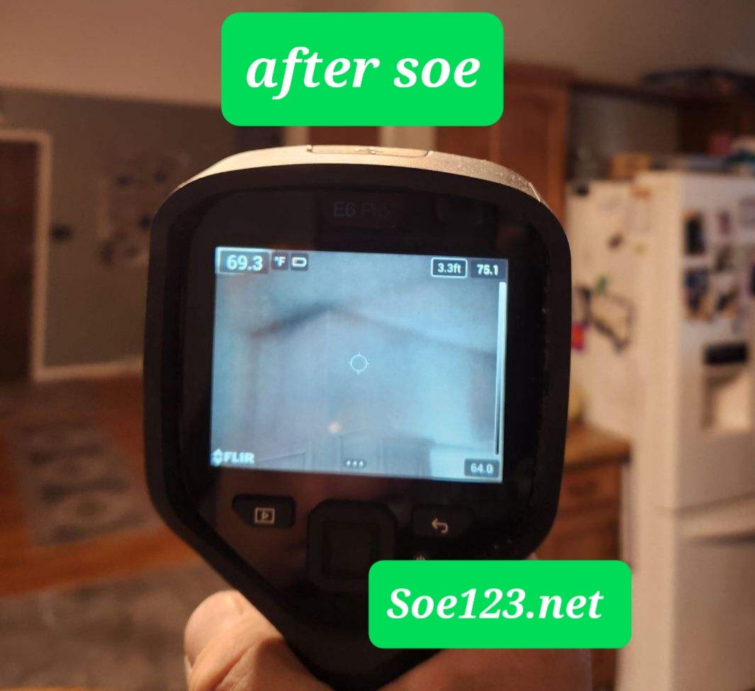 A person is holding a camera that says after soe on it