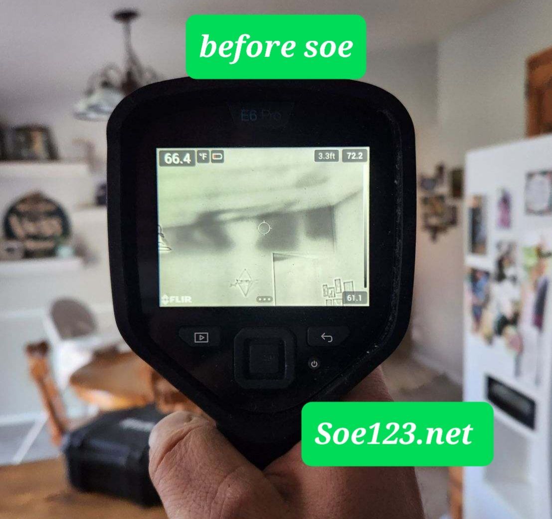 A person is holding a camera that says before soe on it