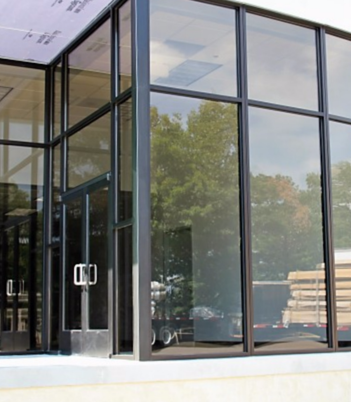 a building with a lot of windows and doors.