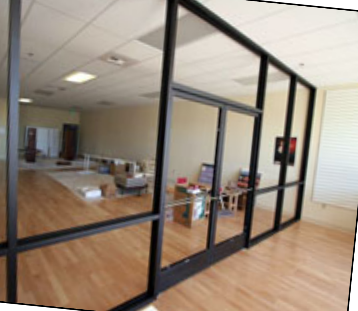 a room with a lot of windows and doors.