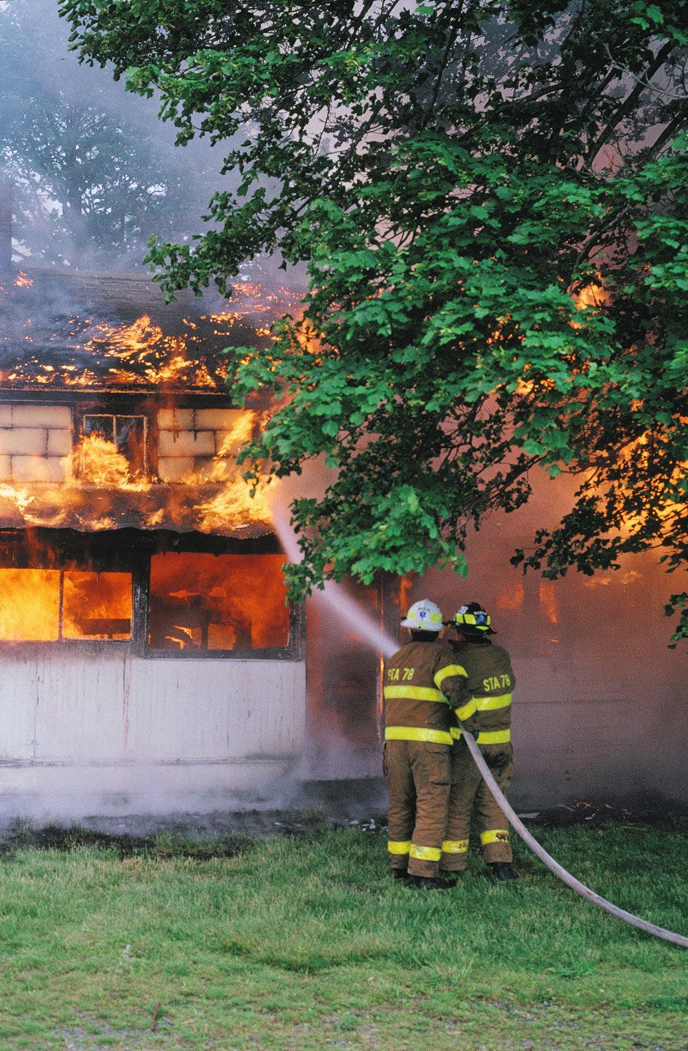 Putting out the fire with hose