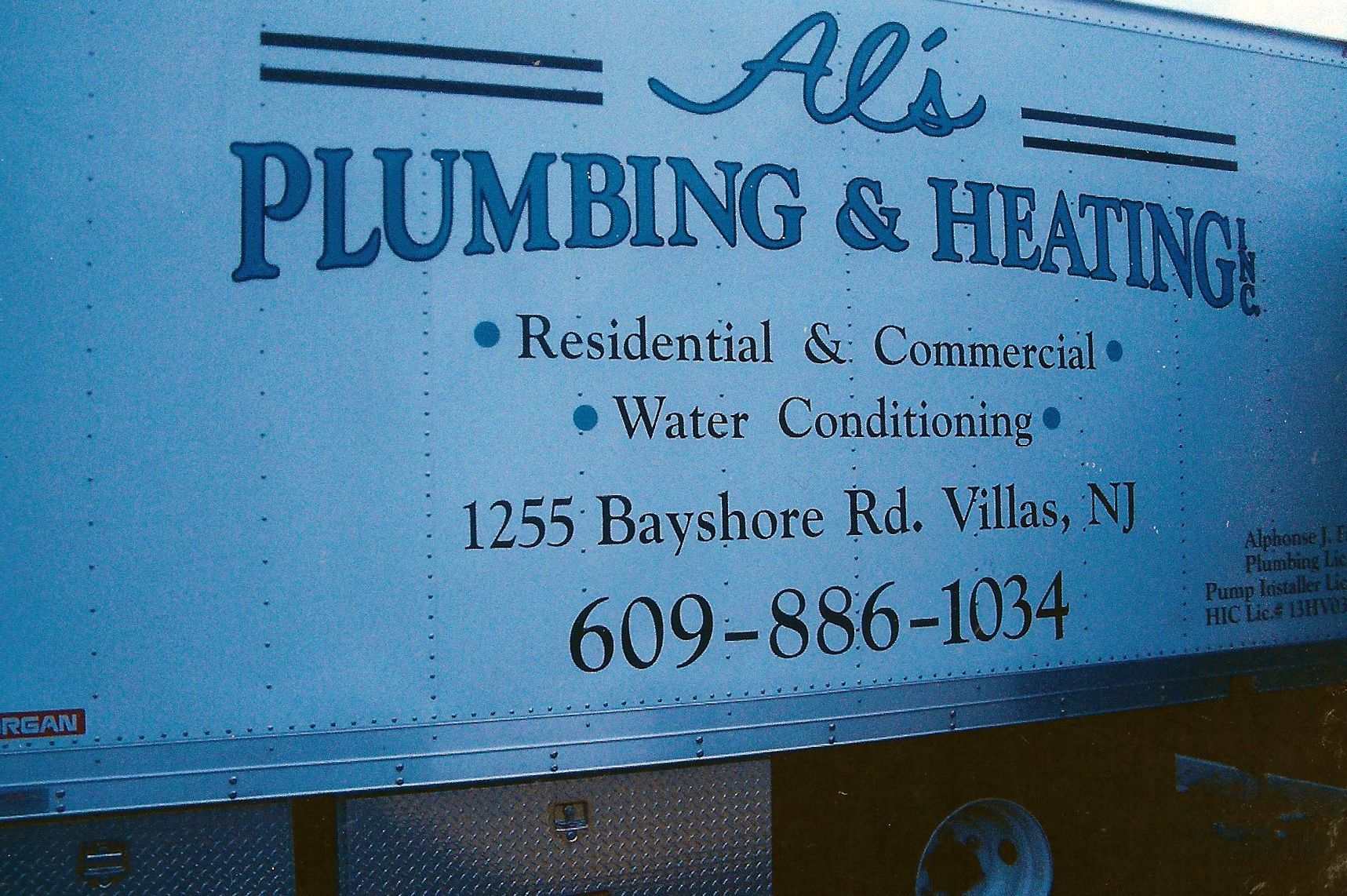 A white truck side displays 