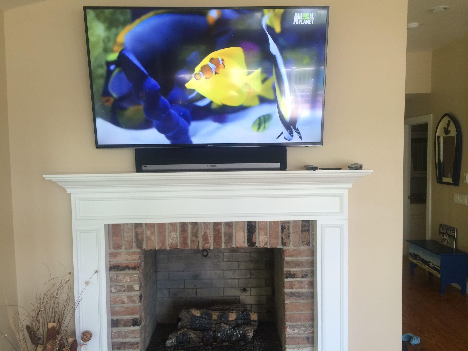 tv mount above fireplace