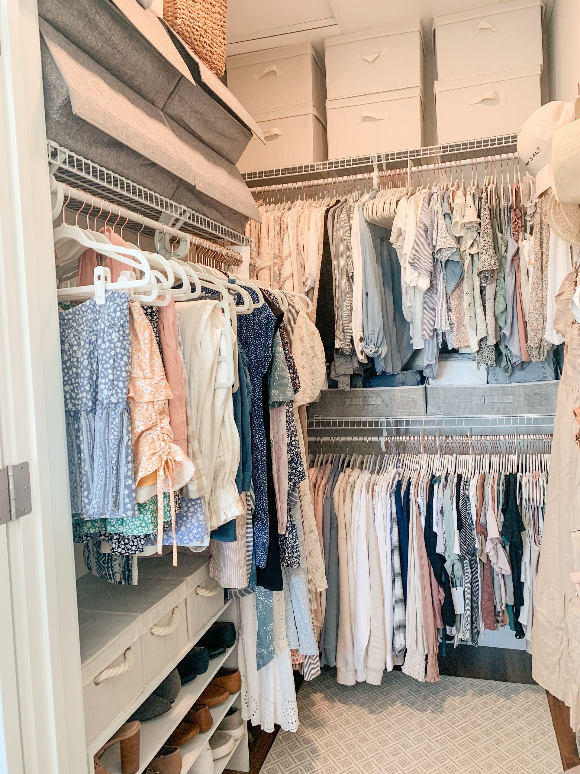 closet with hanging clothes