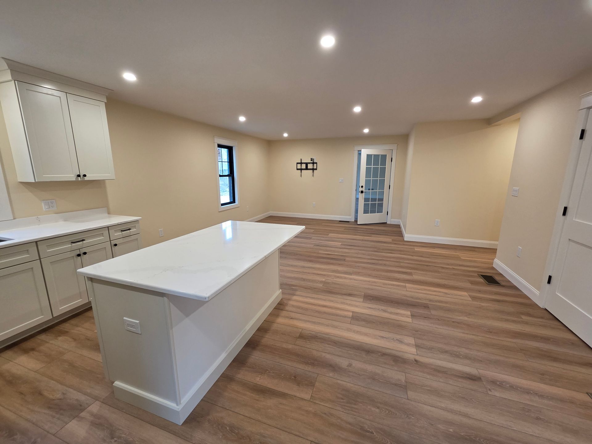 There is a large island in the middle of the room.