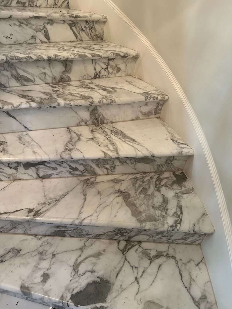 A close up of a set of marble stairs