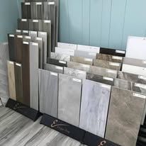 There are many different types of tiles on display in this room.