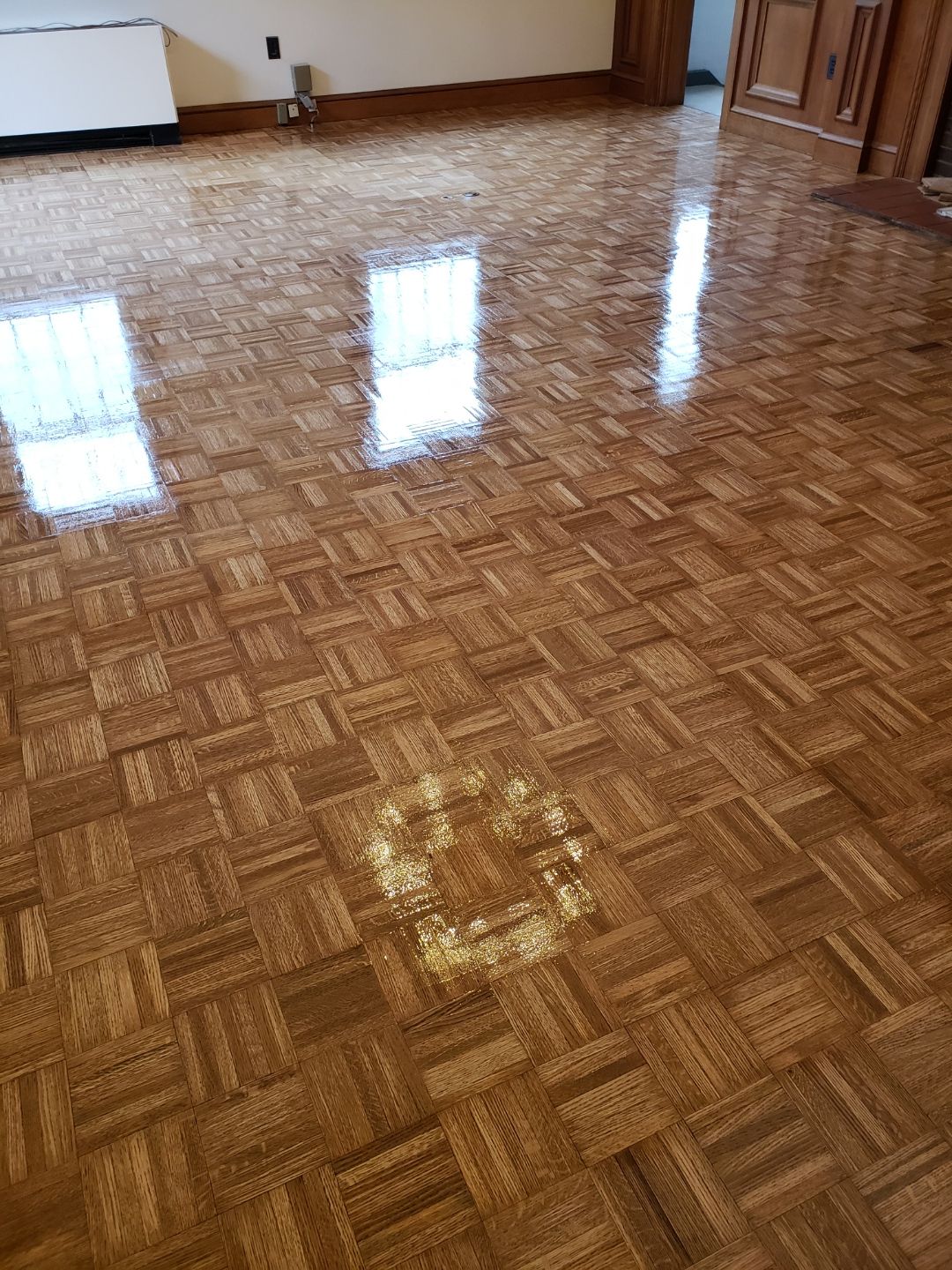 A wooden floor in a room