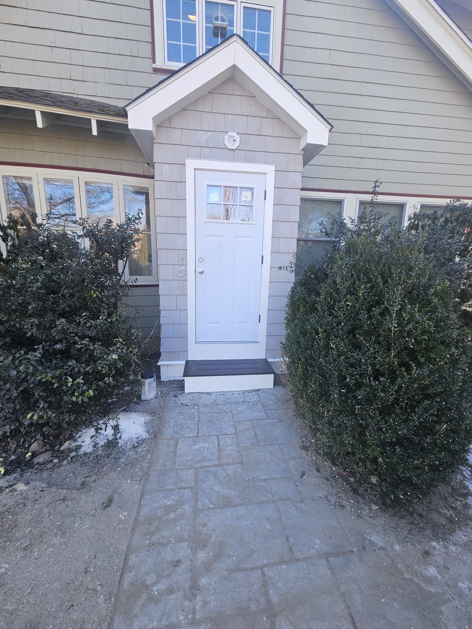 There is a deck with stairs leading up to it.