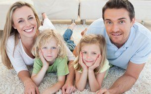 Family on carpet floor