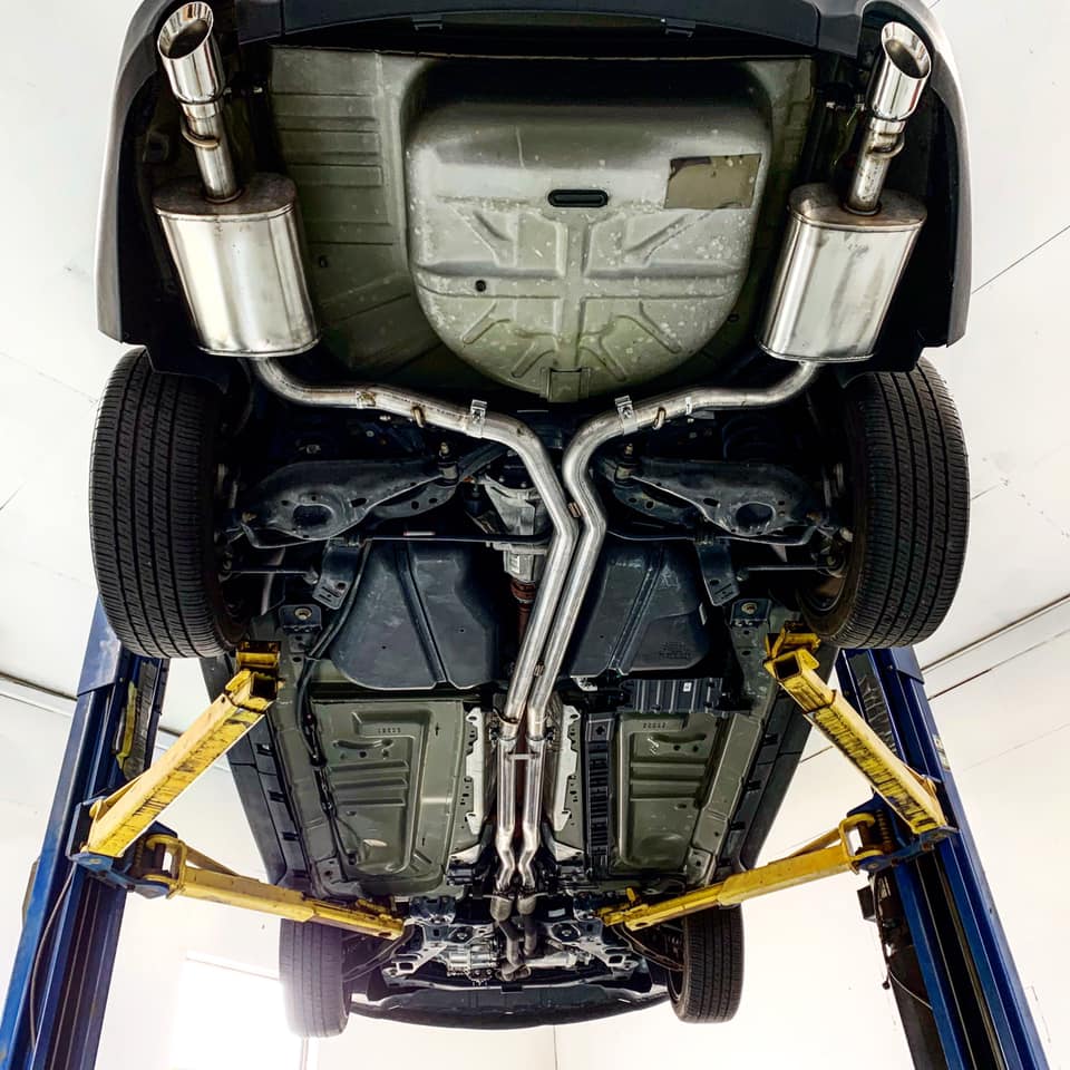 Auto under chassis and exhaust pipes