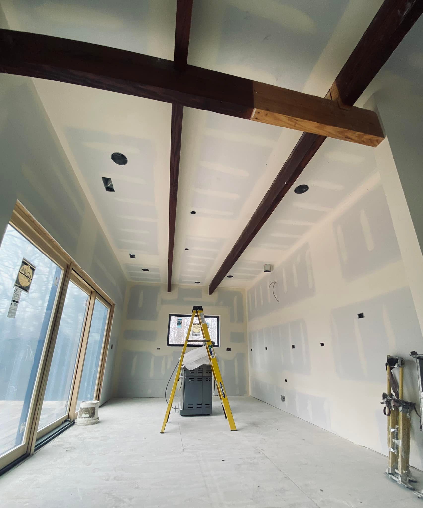 There is a ladder in the middle of the room.