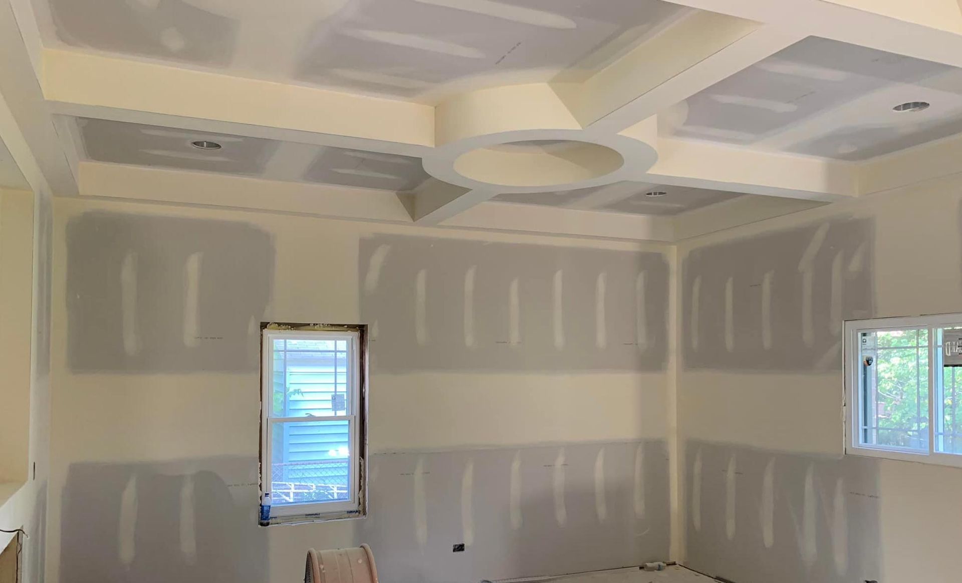 There is a fireplace in the middle of the room.