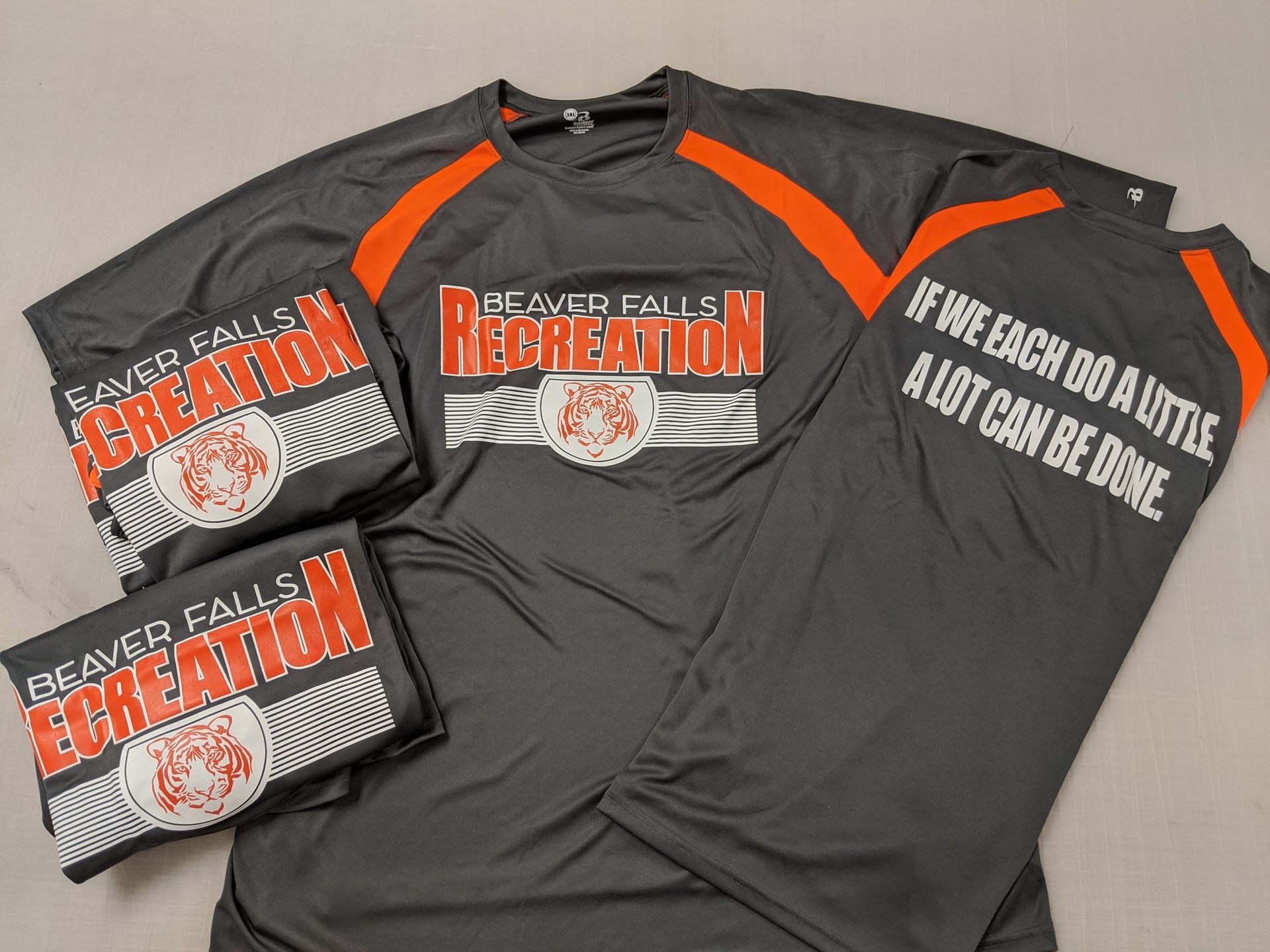 Three shirts with the word recreation on them
