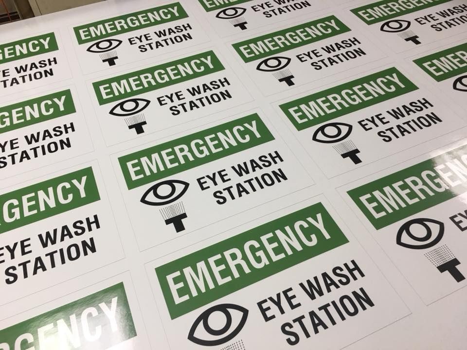 A sheet of emergency eye wash station stickers