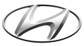 A close up of a hyundai logo on a white background.