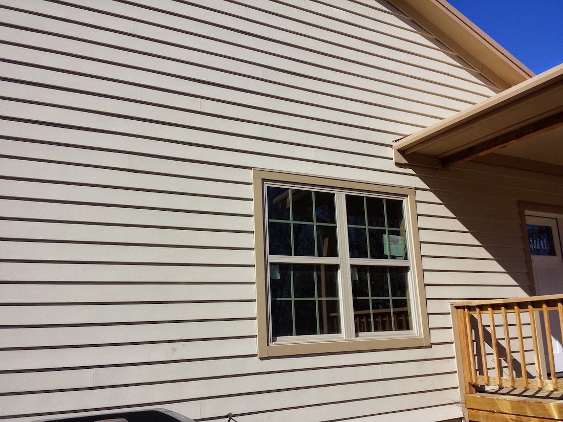 A house with a window on the side of it