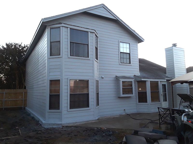 A large white house with a lot of windows