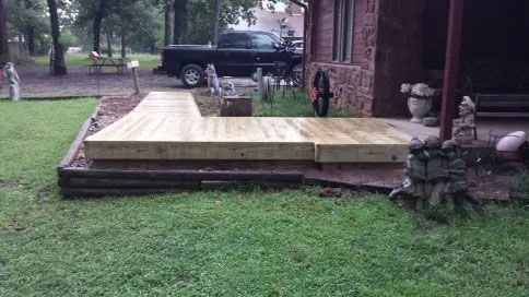 Wooden floor and green grass.