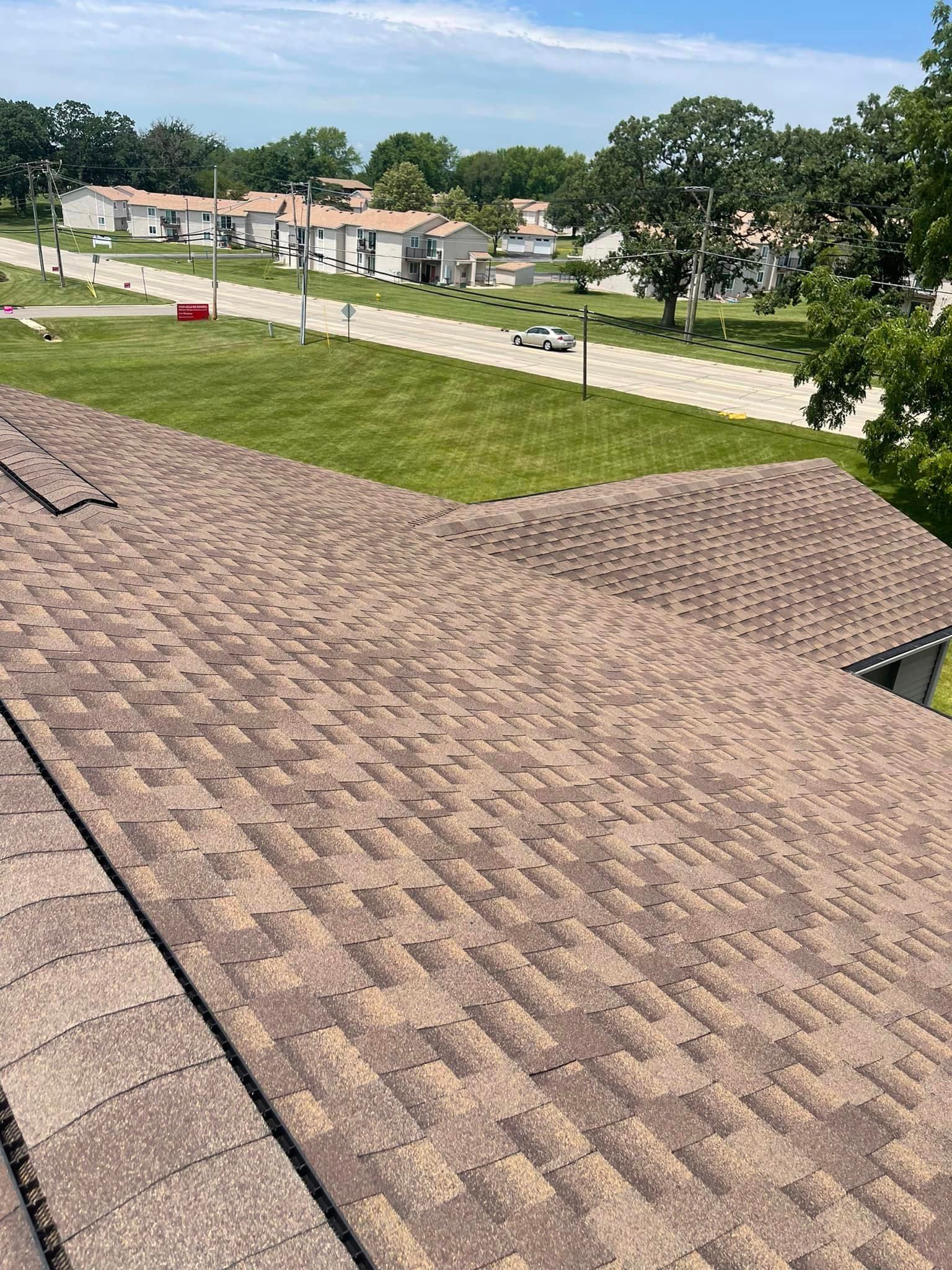 The roof of a house with a lot of shingles on it.