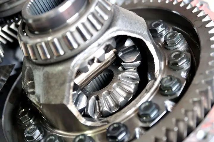 Close-up of metal gears and bearings in a mechanical assembly