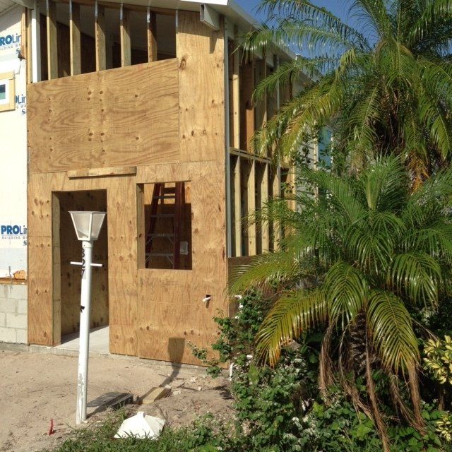 A house that is being built with the word pro on the side