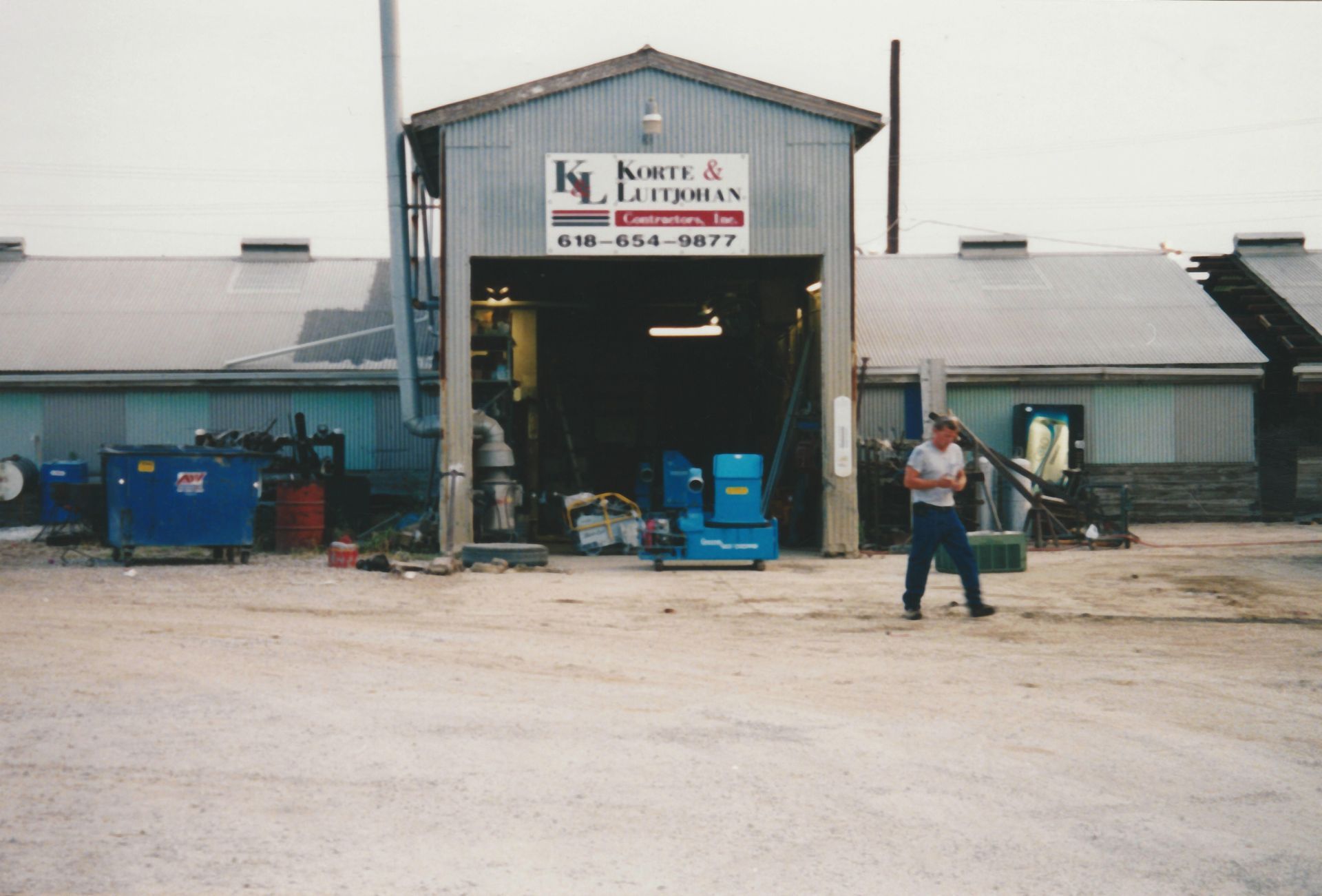 A man standing in front of a building that says north & letterman