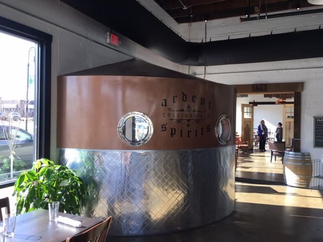 A room with a sign that says ardent spirits