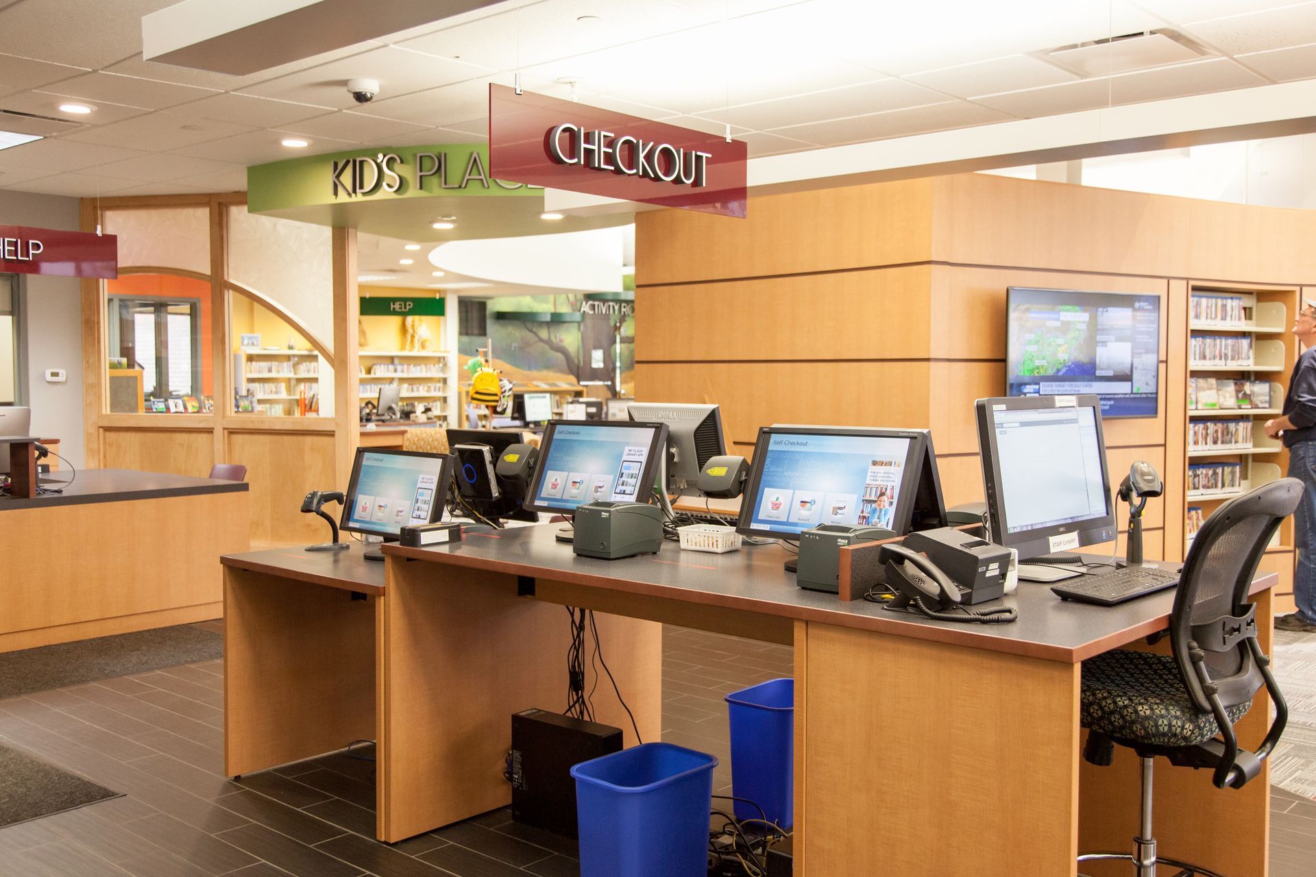 A library with a sign that says check out on it