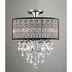 Sparkly chandelier in bedroom
