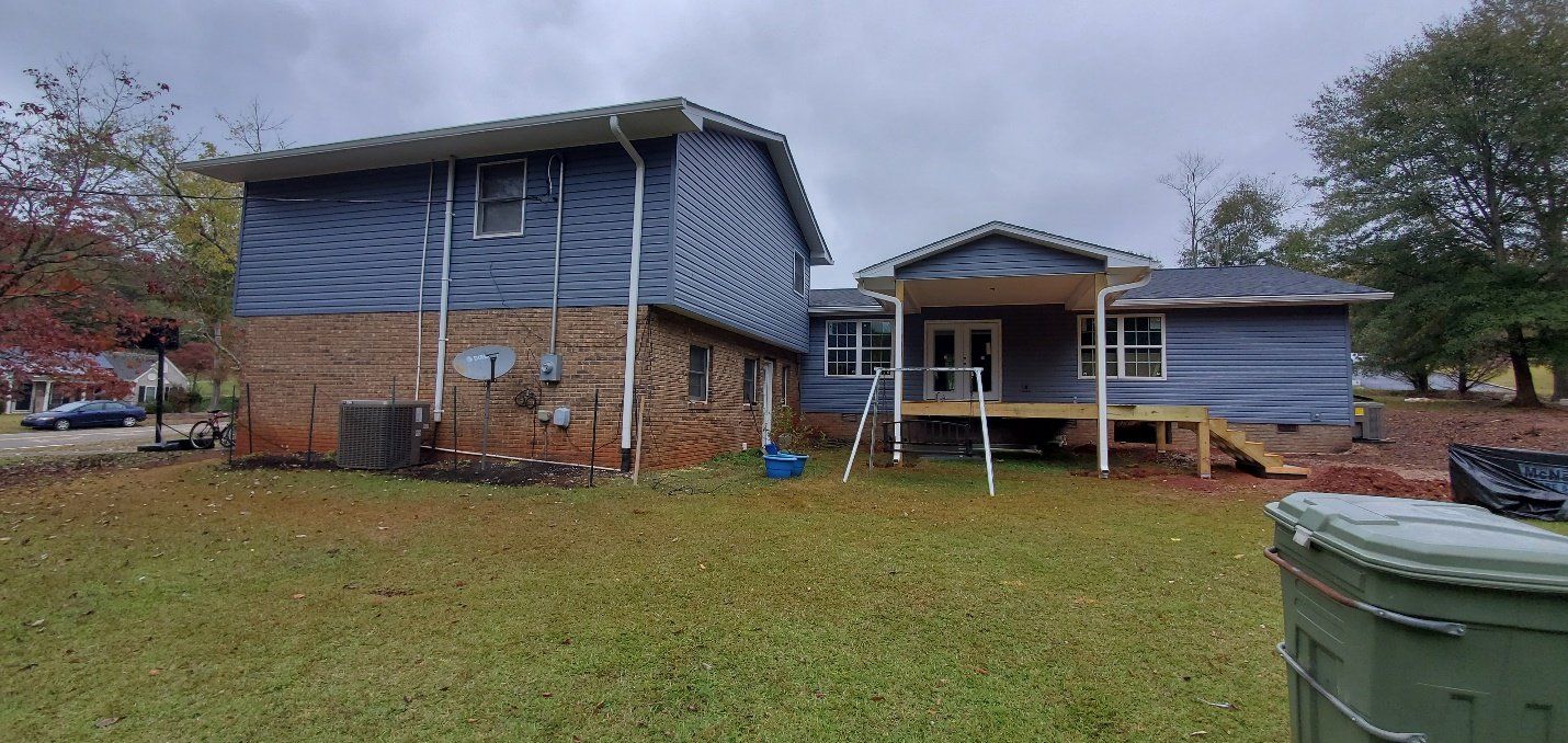 living room and master suite with deck