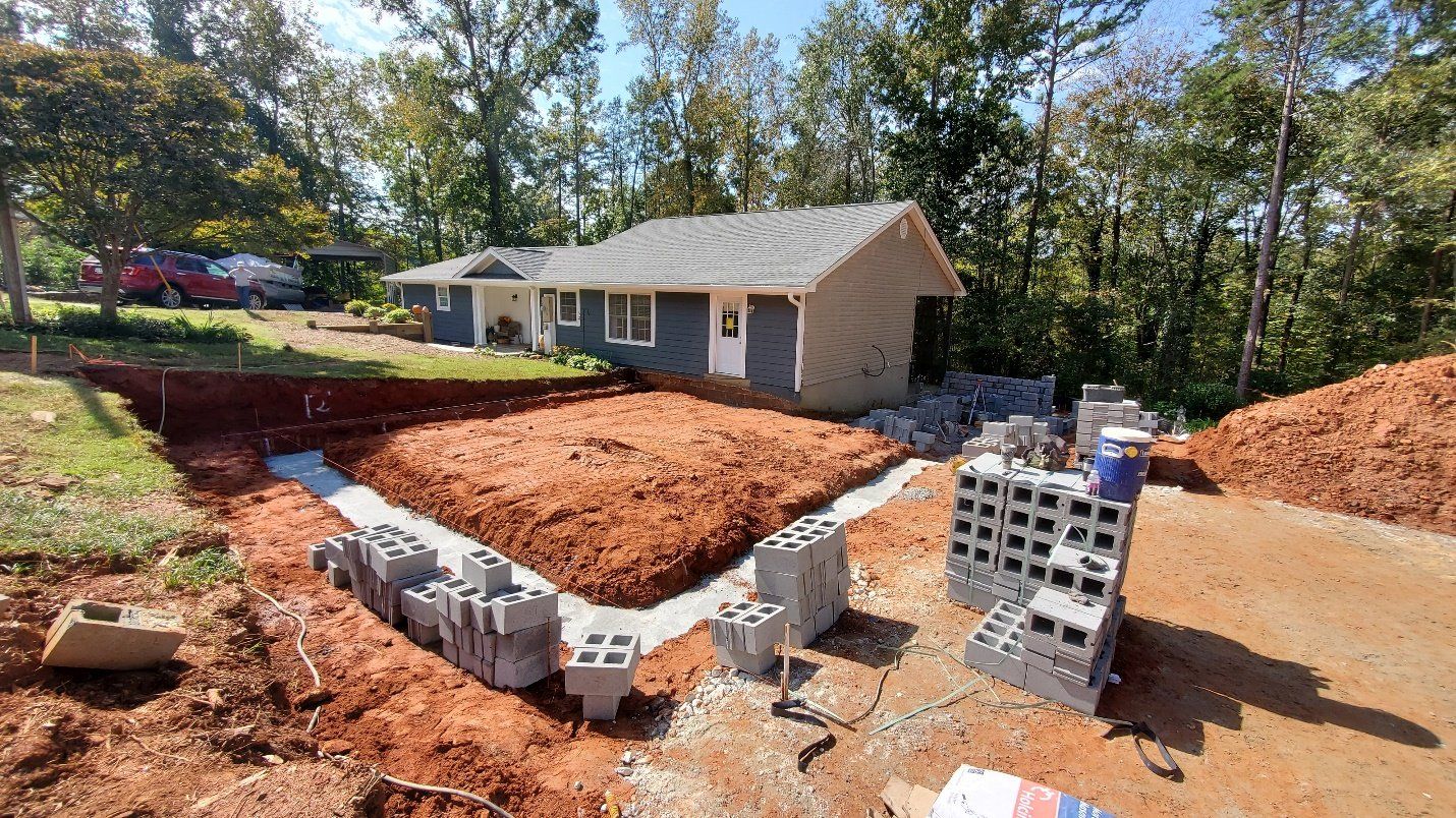 construction of the master suite and garage addition