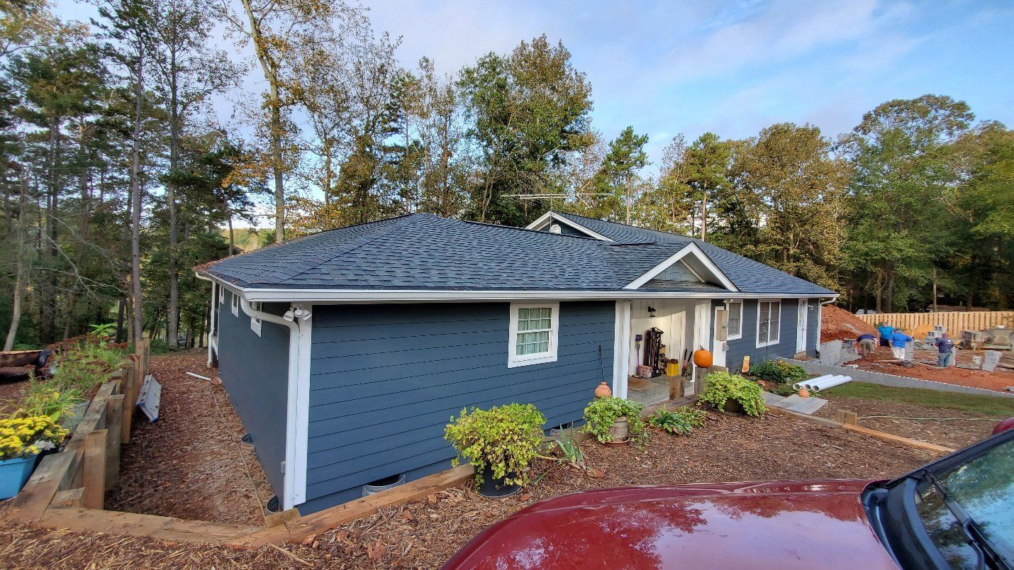 blue bungalow with addition