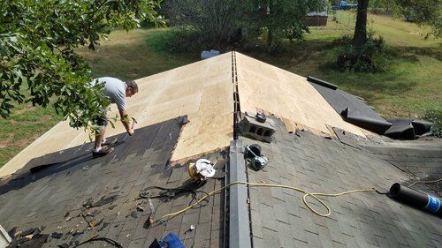 Tree damaged and remodeled home