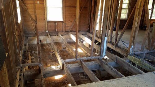 Tree damaged and remodeled home