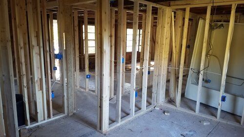 Tree damaged and remodeled home