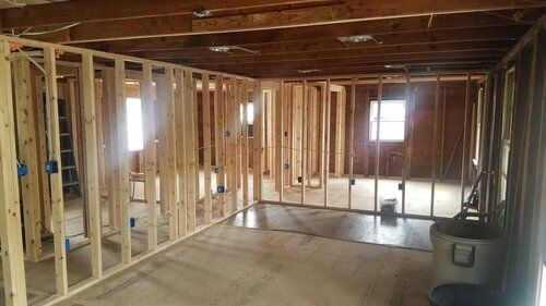 Tree damaged and remodeled home