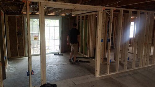 Tree damaged and remodeled home