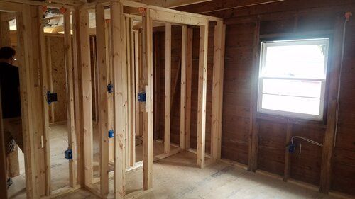 Tree damaged and remodeled home