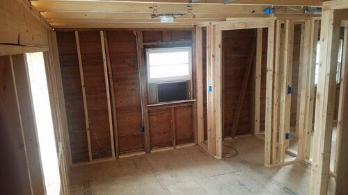 Tree damaged and remodeled home