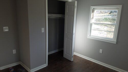 Tree damaged and remodeled home