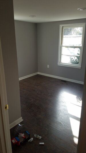 Tree damaged and remodeled home