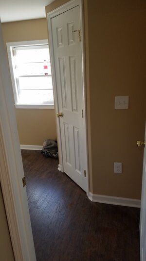 Tree damaged and remodeled home