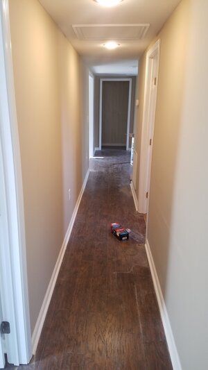 Tree damaged and remodeled home