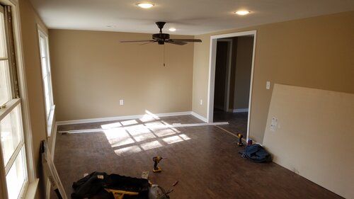 Tree damaged and remodeled home