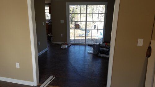 Tree damaged and remodeled home