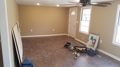 Tree damaged and remodeled home