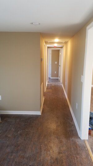 Tree damaged and remodeled home